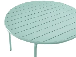 Metalen Tuinsalon Mirmande - Tafel D110 Cm + 4 Stapelbare Fauteuils - Amandelgroen